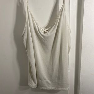 Cream tank top with crisscross detail in the front